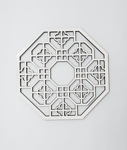 white laser cut coaster
