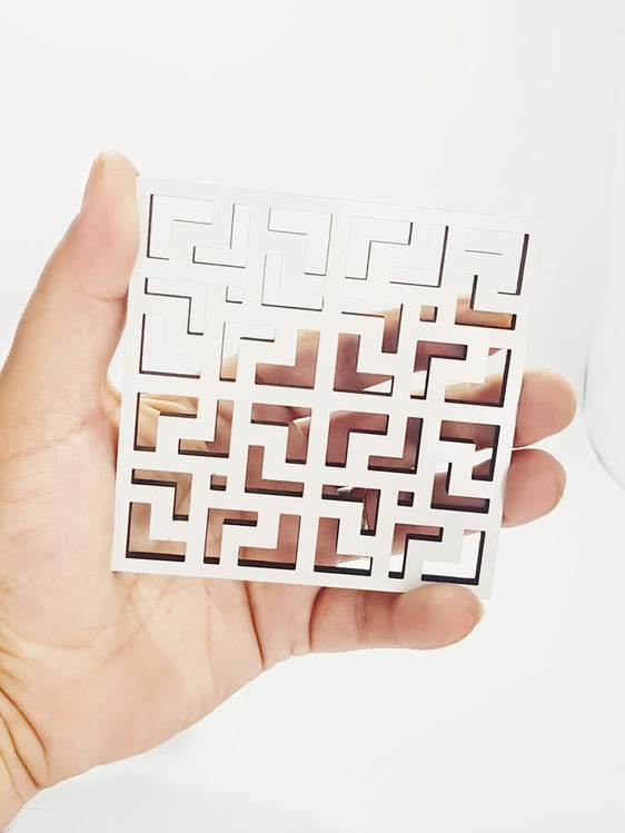 white coaster laser cut
