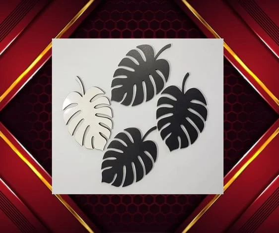 black and white coaster leaf design laser cut